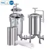 Stainless steel duplex multi-bag filter housing for uninterrupted liquid processing